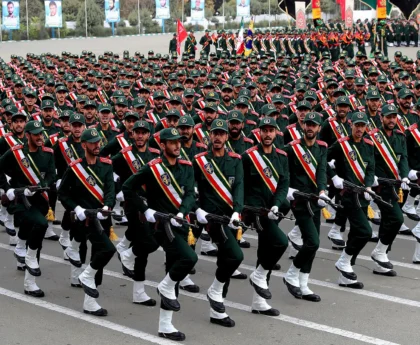 A picture of hundreds of IRGC members marching in ceremonial uniform in Tehran.
